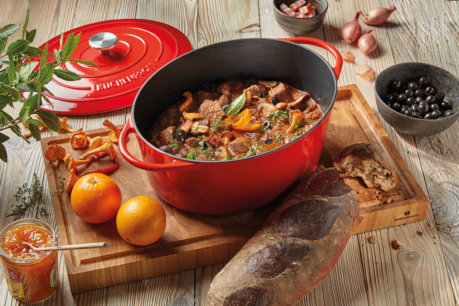 Kuchenprofi Provence Enameled Cast Iron Oval Dutch Oven, 13" L, 7.4 qt, Classic Red