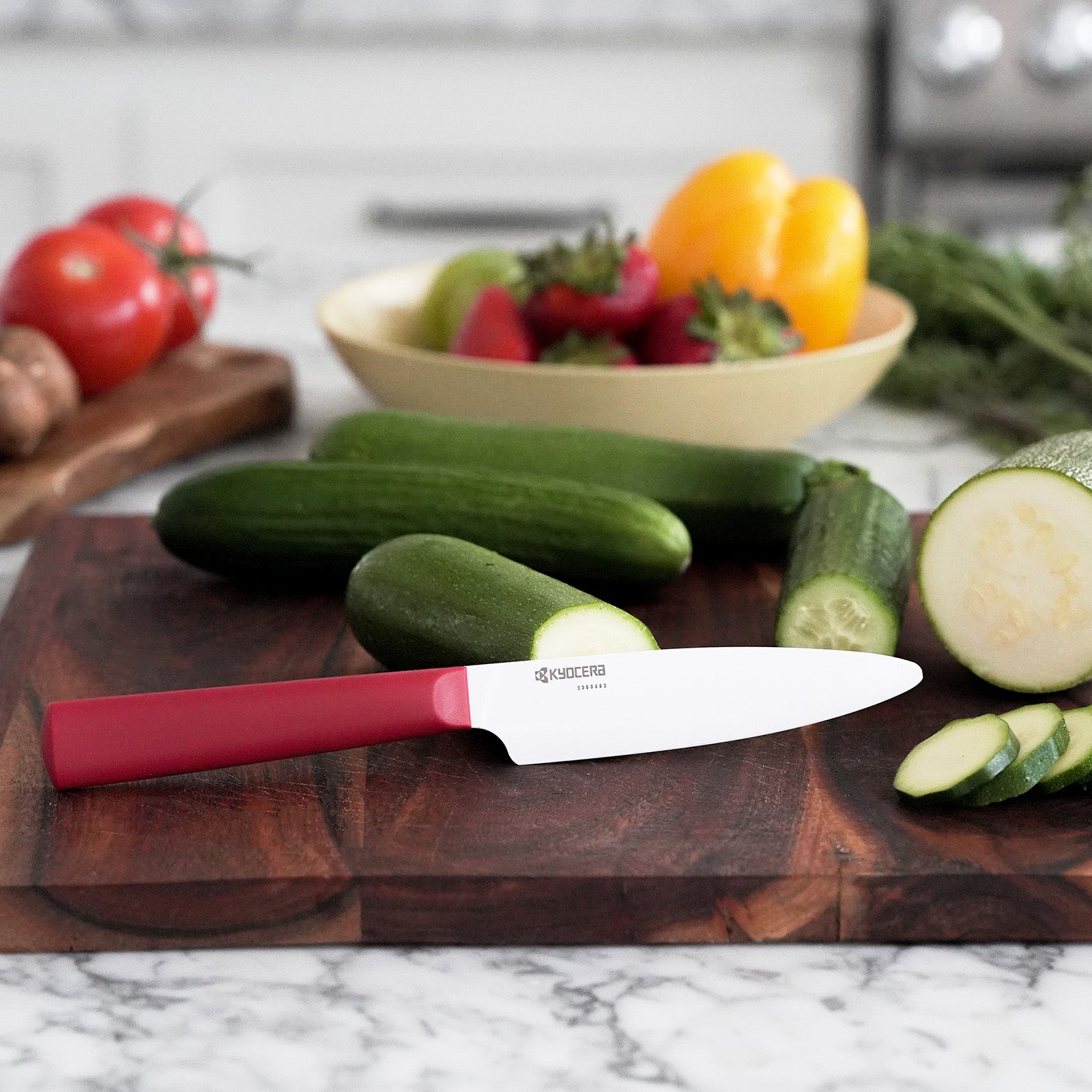Kyocera INNOVATIONwhite® 4.5-Inch Ceramic Utility Knife, White Blade with Non-Slip Red Handle